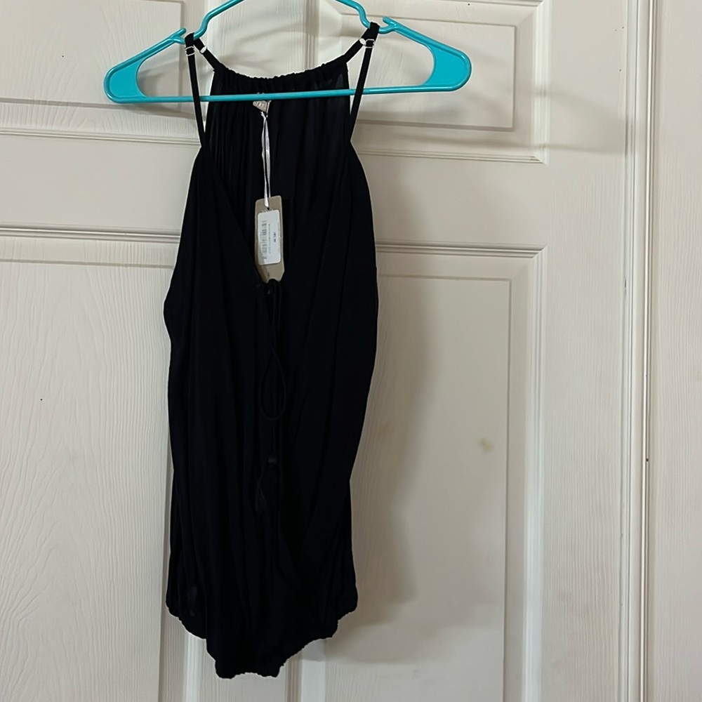 Khush.  Never worn.  Elastic bottom.